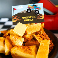 monster truck food labels - flag, flames and big truck on a mound of dirt